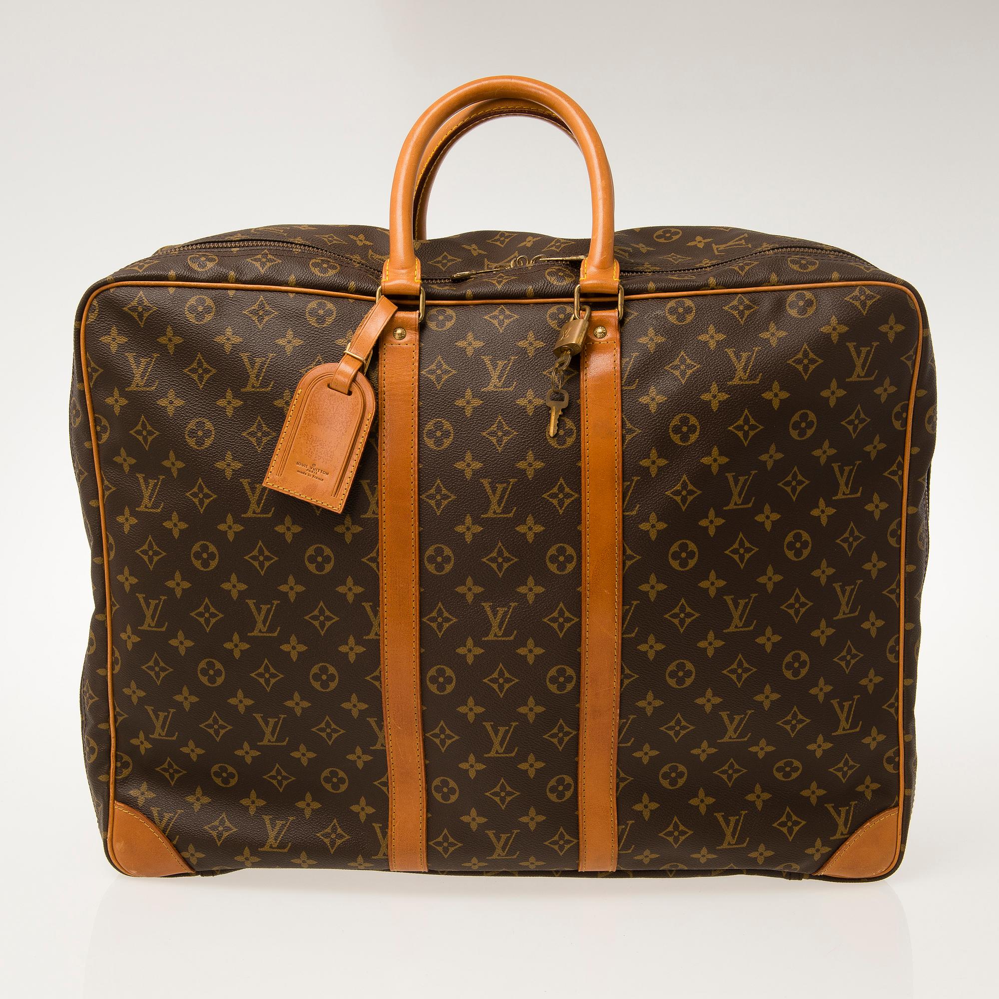 LOUIS VUITTON, Monogram Canvas Sirius Suitcase.