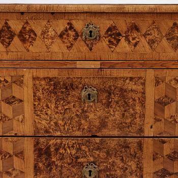 A late Gustavian burr alder-veneered commode, Mälardalen, late 18th century.