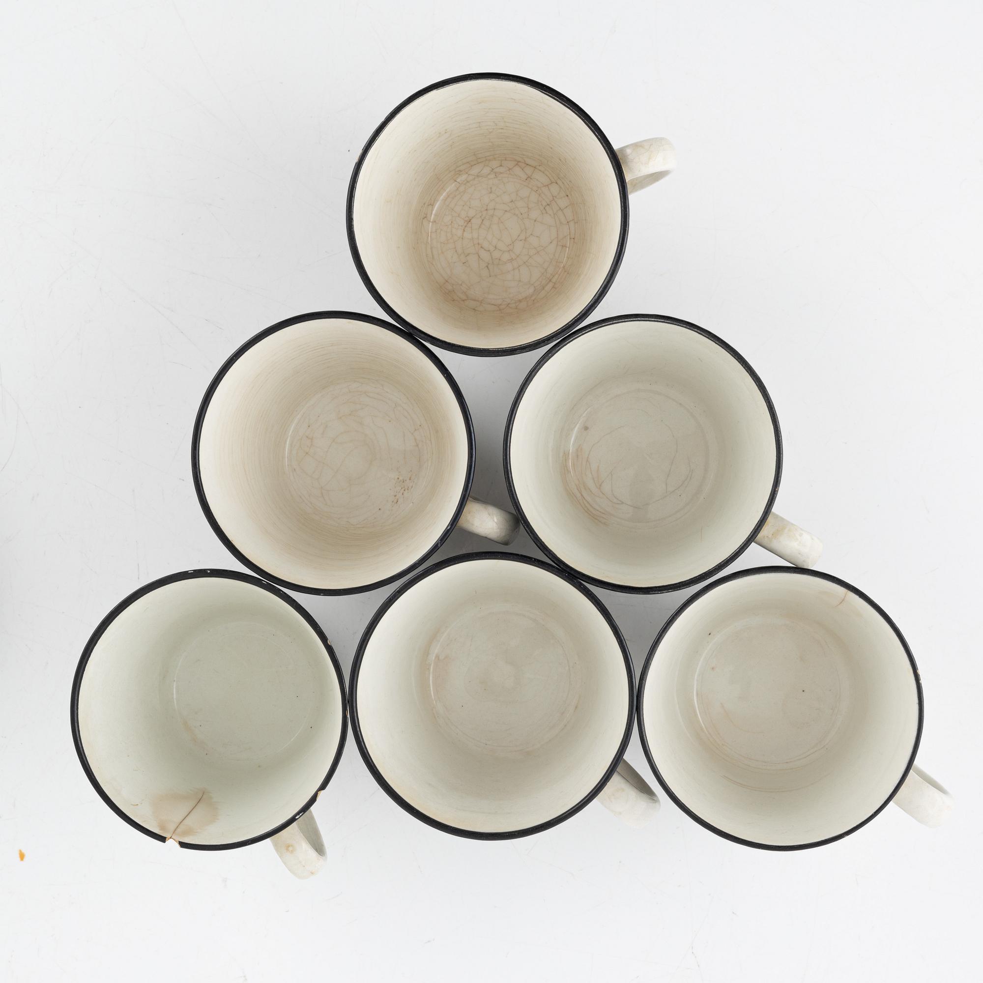 Eugen Trost, eleven coffee cups with three saucers, 'Zebra', Upsala-Ekeby Gefle.
