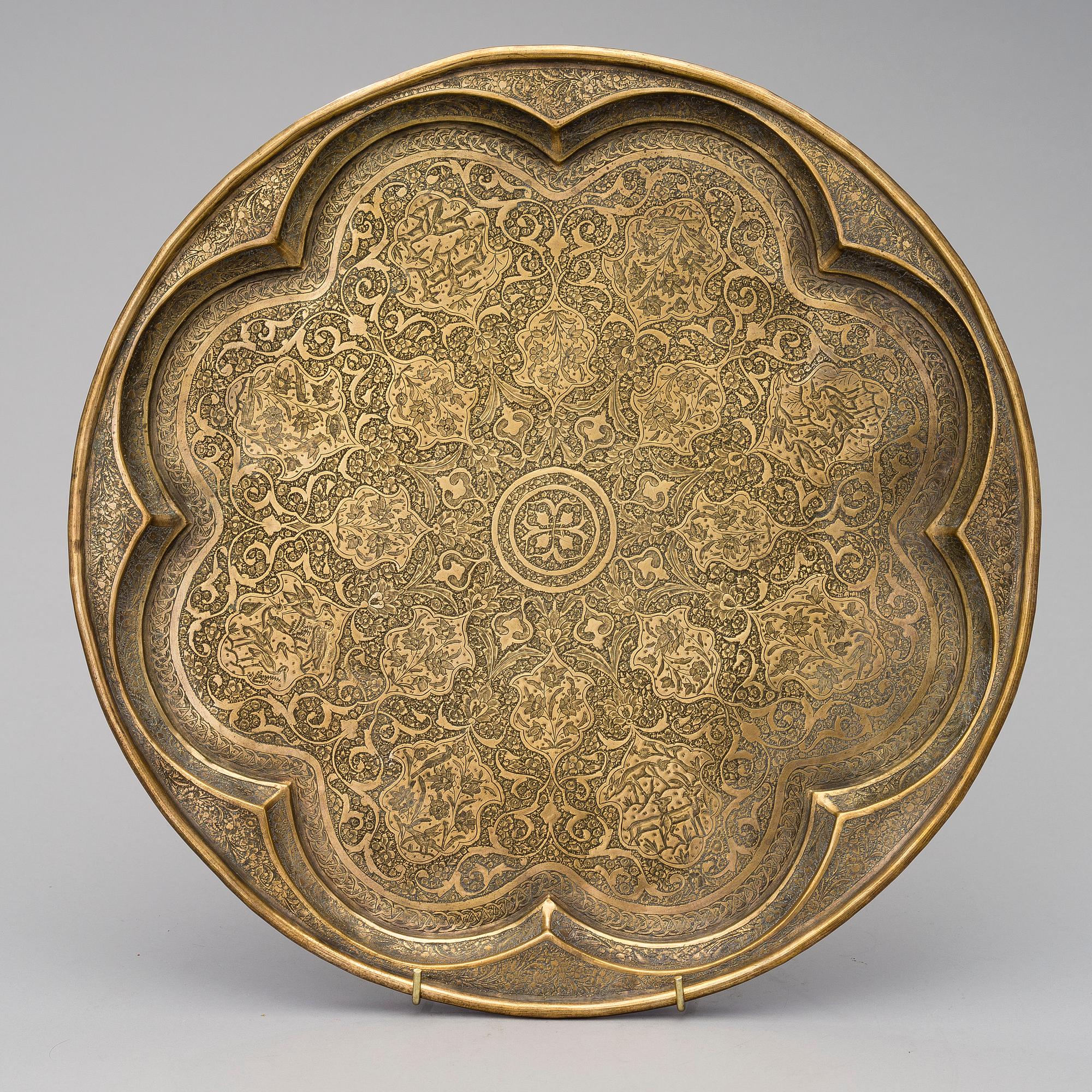 A Persian Qajar brass tray, circa 1900.