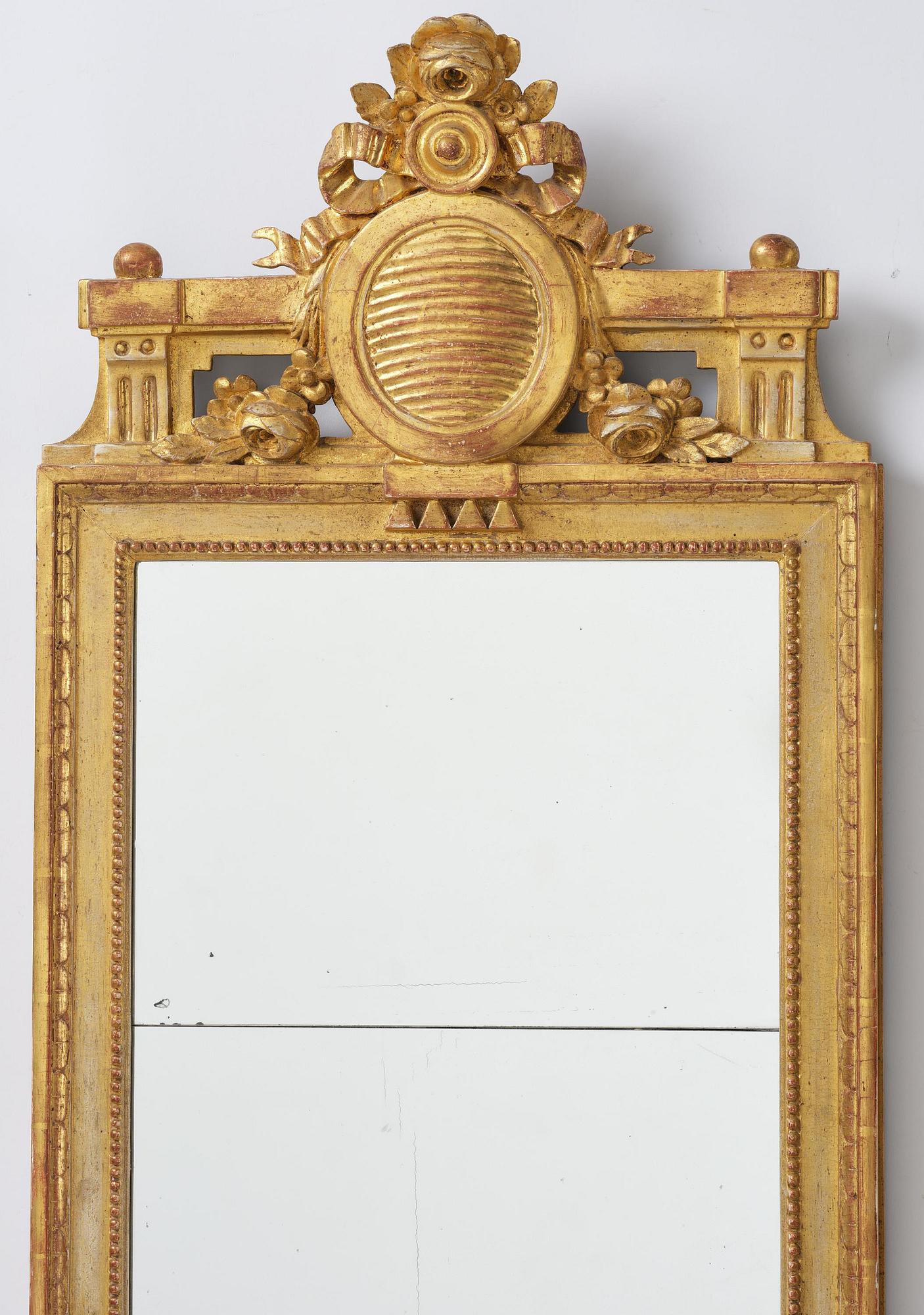 A Gustavian giltwood mirror by J. Åkerblad (master in Stockholm 1758-99).