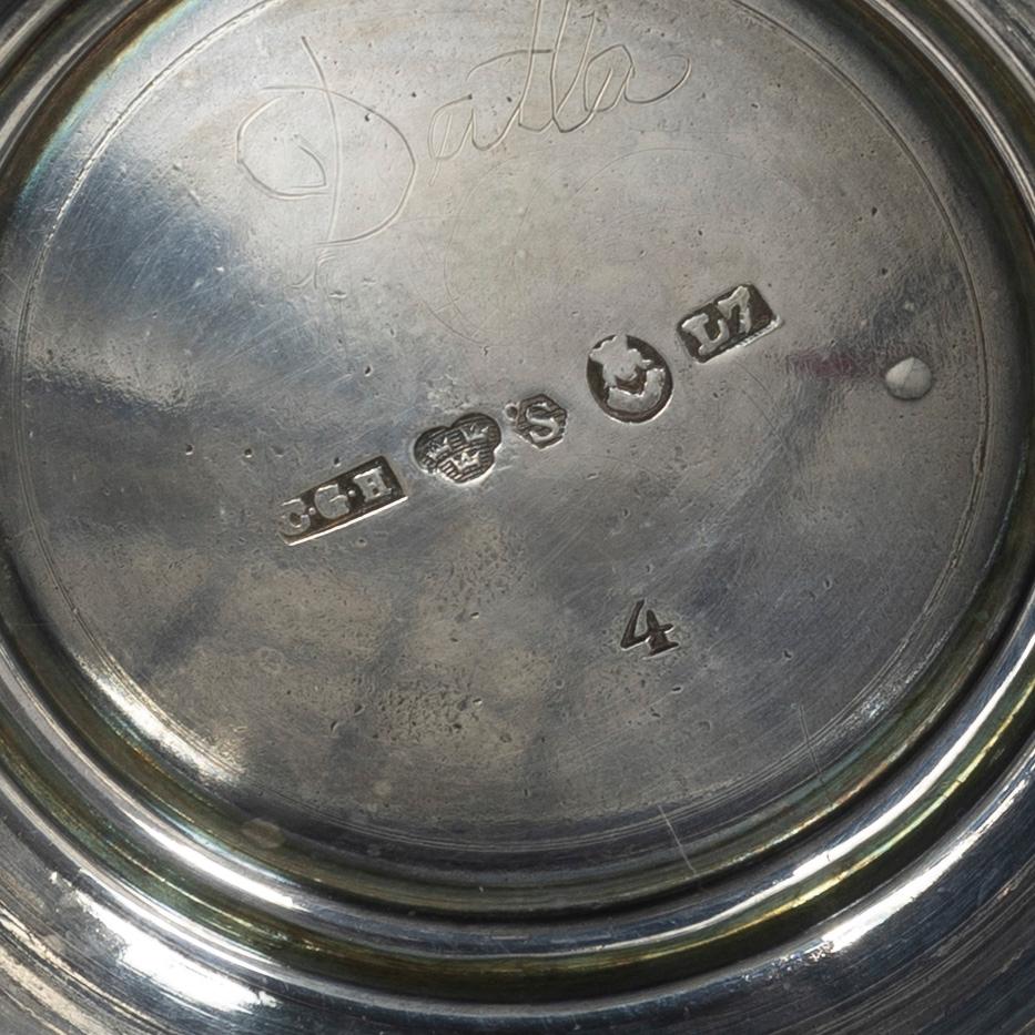 A Swedish silver cup and two beakers.