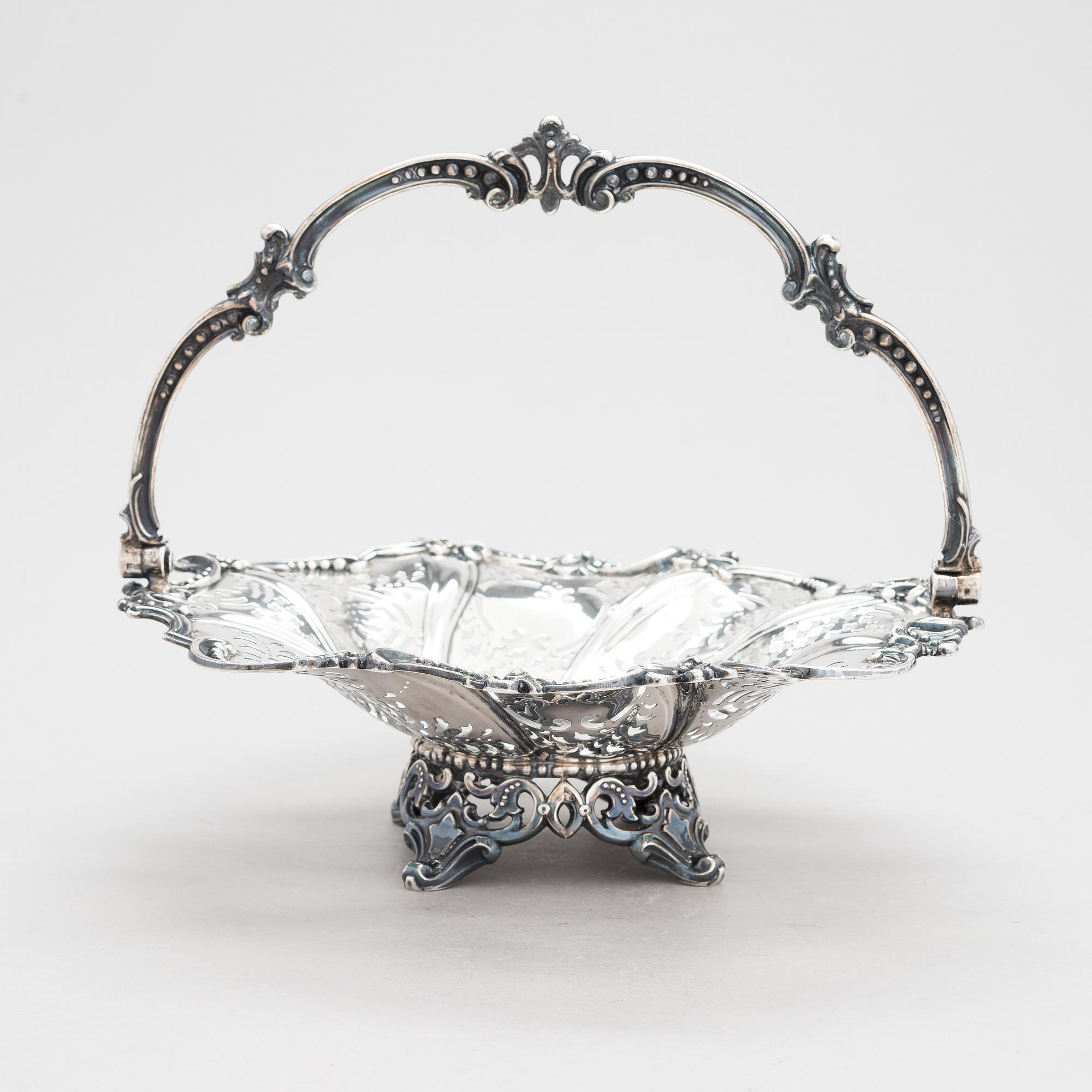 A Victorian sterling silver sweetmeat basket, maker's mark of Henry Wilkinson & Co, Sheffield 1855.