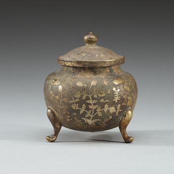 A silver gilt tripod censer, presumably Tang dynasty.