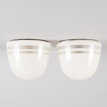 Harald Notini,  a pair of ceiling lamps, version of model "10148", Arvid Böhlmark's Lamp Factory, 1930s.