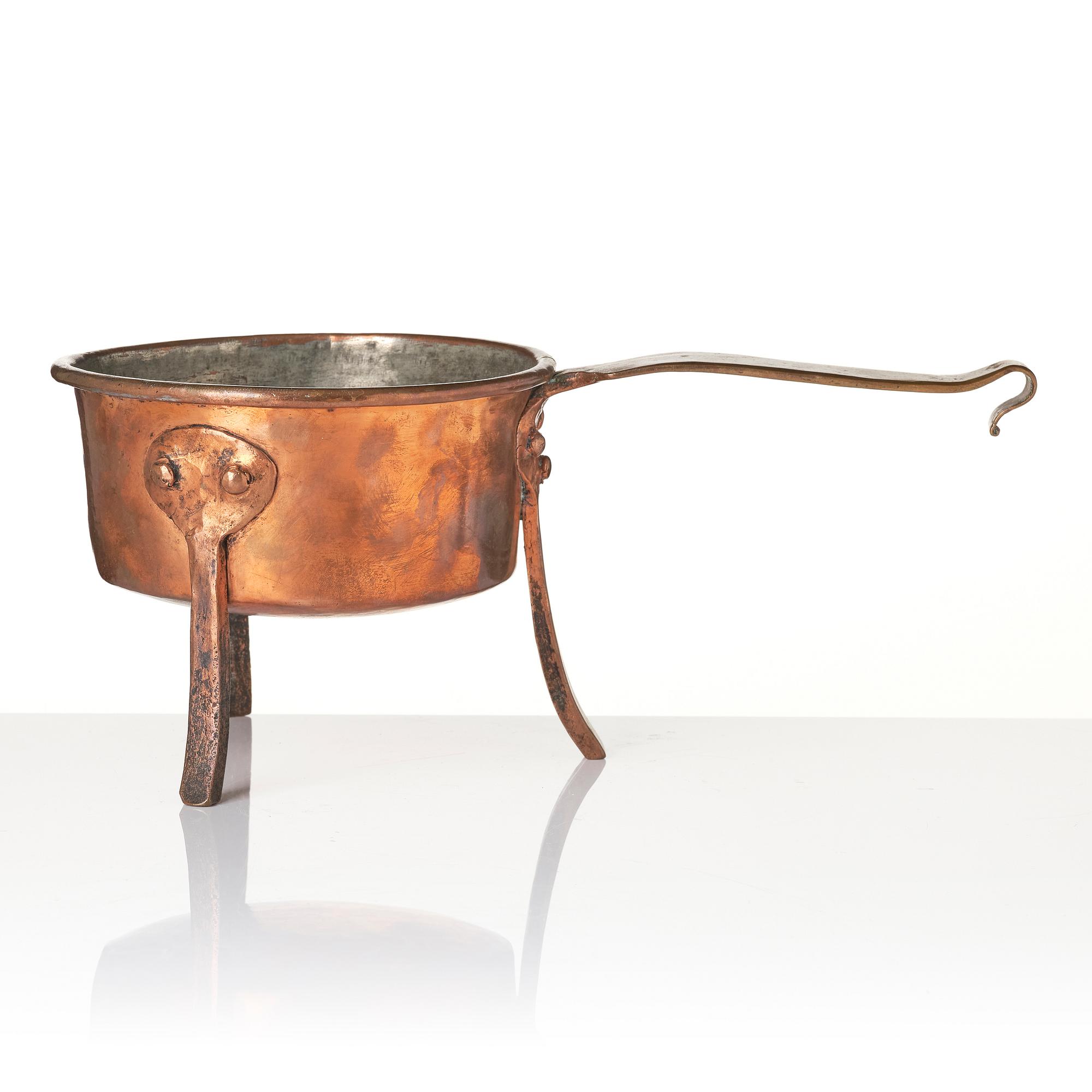 A copper saucepan, 18th century.