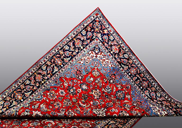 A carpet, Mashad, ca 345 x 242 cm.