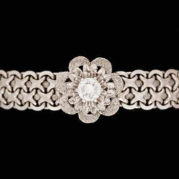 ARMBAND, 18k vitguld med briljantslipad diamant ca0,62ct. Italien. Vikt 31,2g.