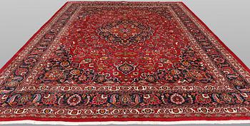 A signed Mashad carpet, ca 375 x 303 cm.