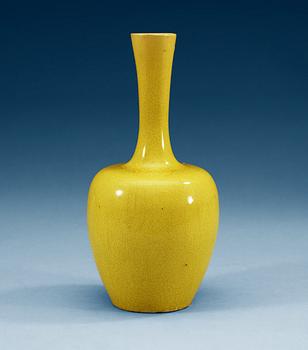 A yellow glazed vase, Qing dynasty.