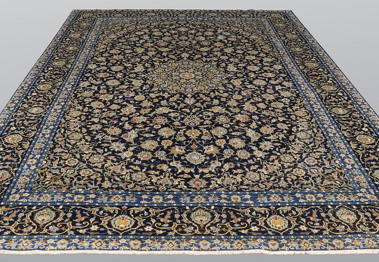 A carpet, Kashan signed, ca 395 x 277 cm.