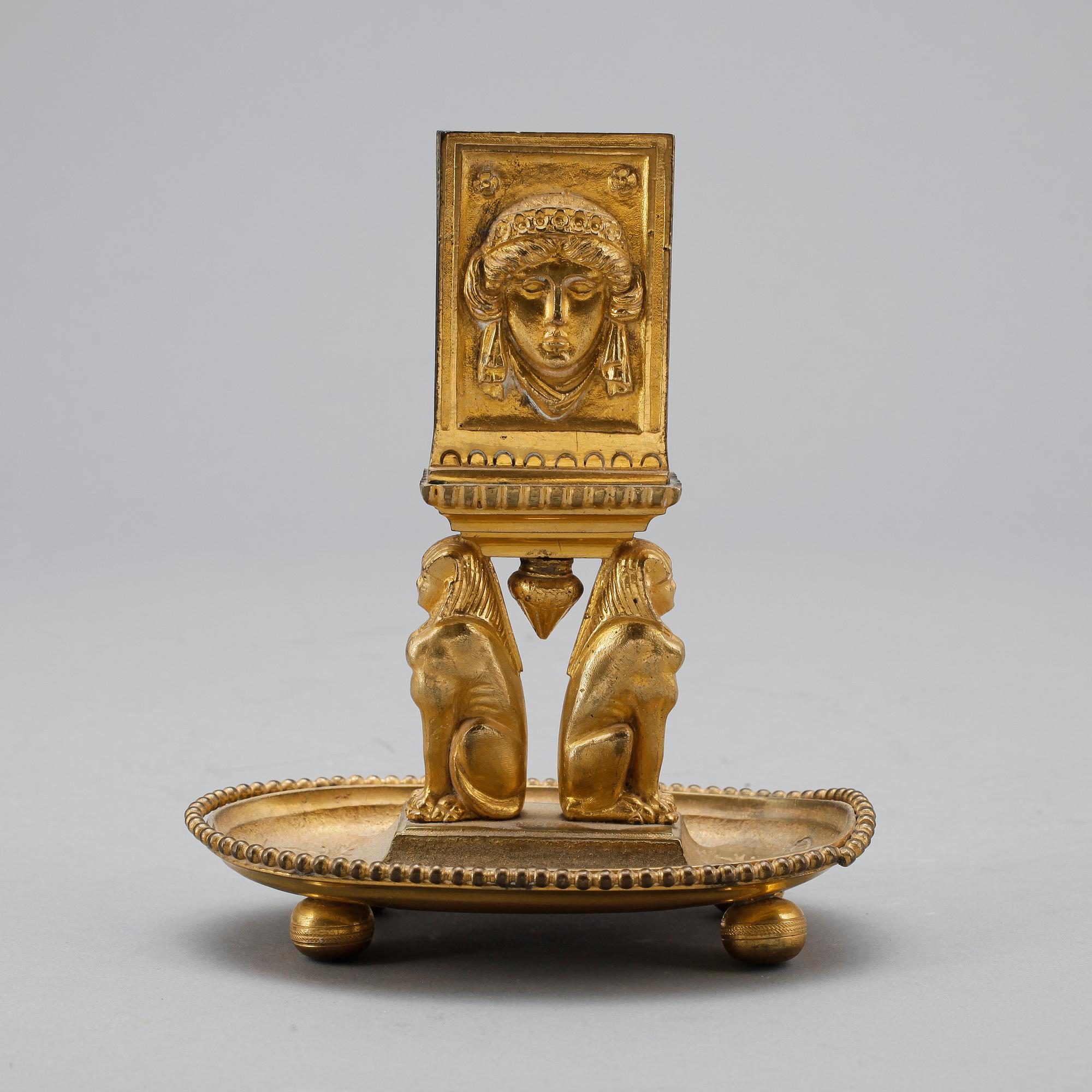 TÄNDSTICKSSTÄLL, empirestil, omkring 1900.