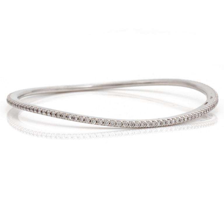 A brilliant cut diamond "Love bracelet" bangle by Ole Lynggard.