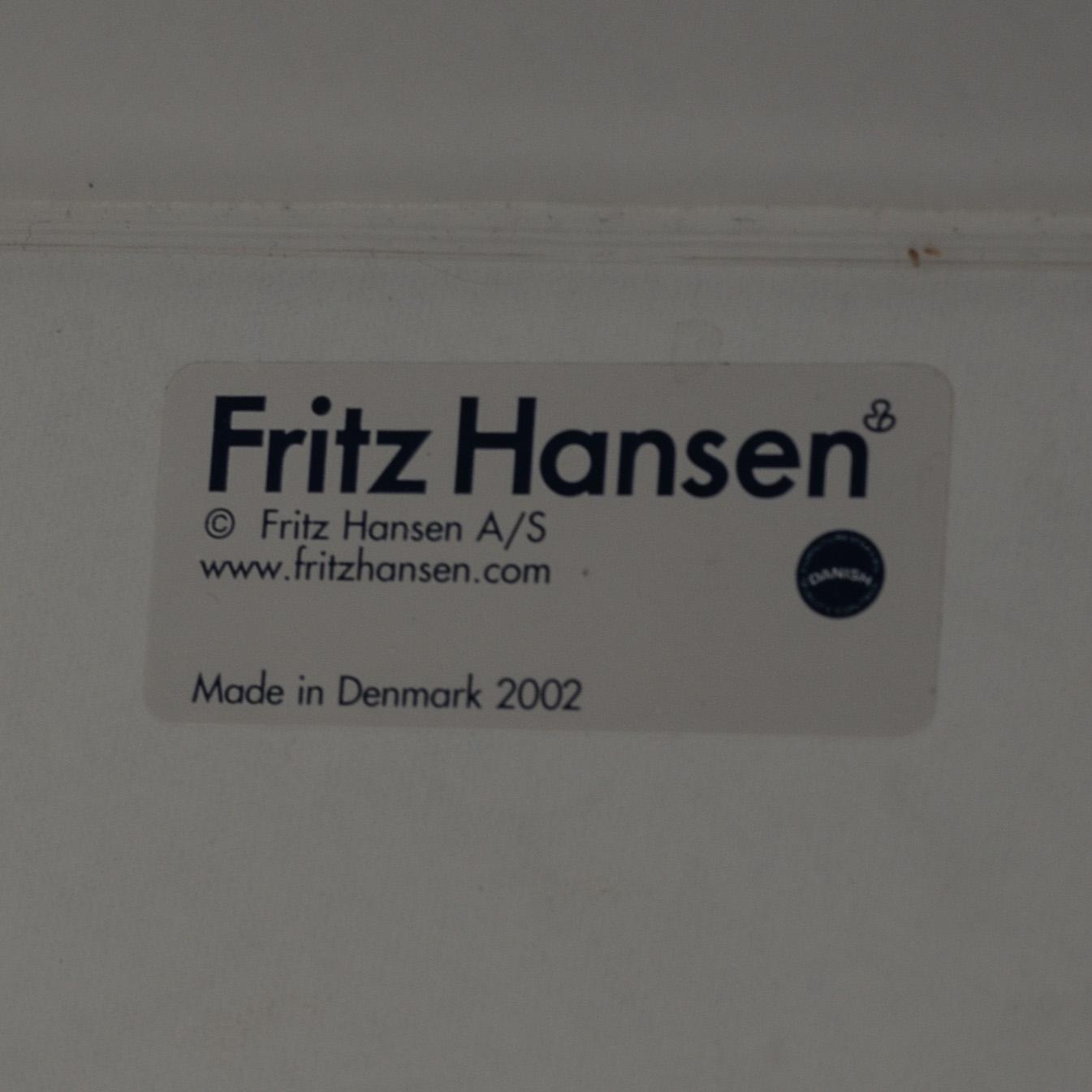 ARNE JACOBSEN, a table from Friz Hansen, Denmark, 2002.