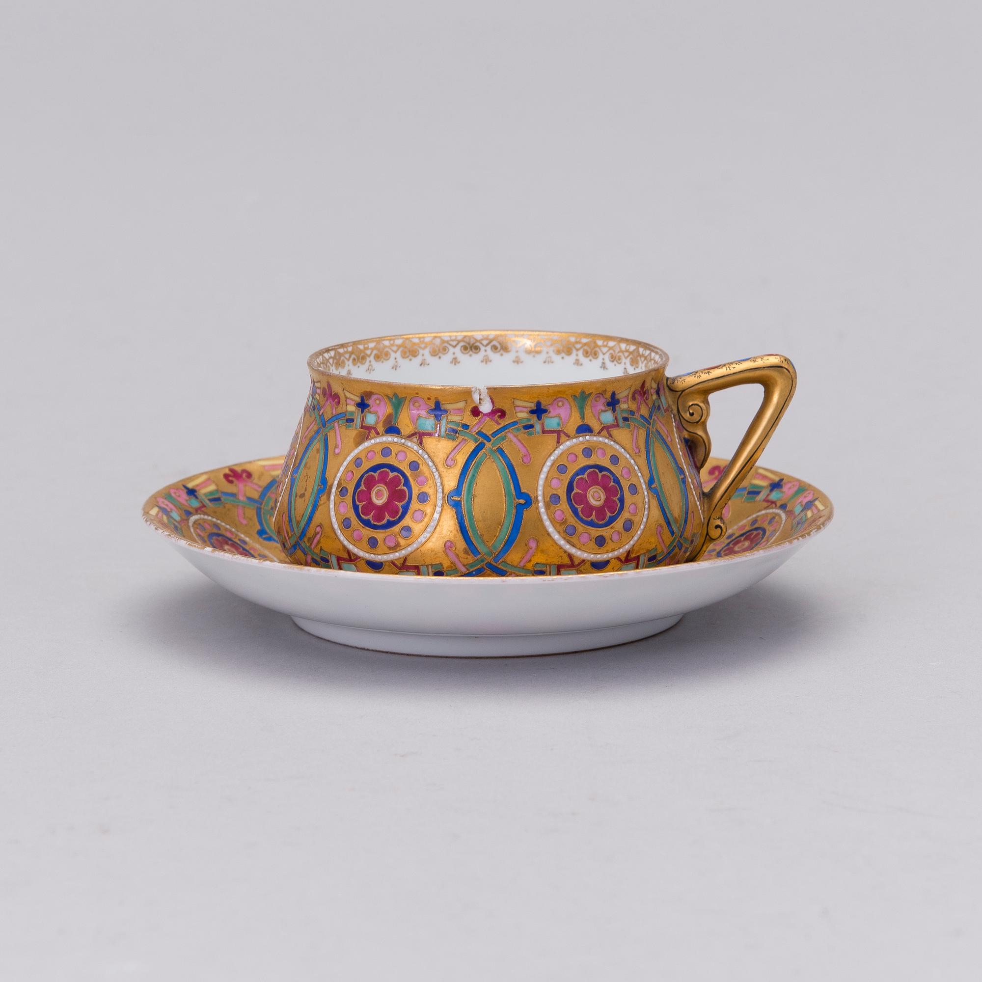 A Kuznetsov porcelain cup with saucer, Dmitrov factory, Russia 1894-1917.