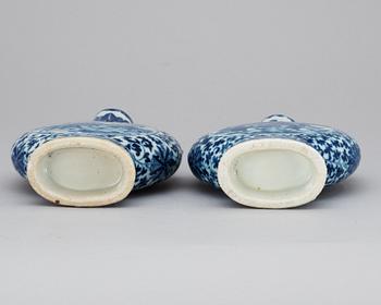 Two blue and white moon flasks, late Qing about 1900.