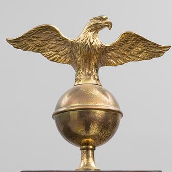 A long-case clock, England, 19th century.