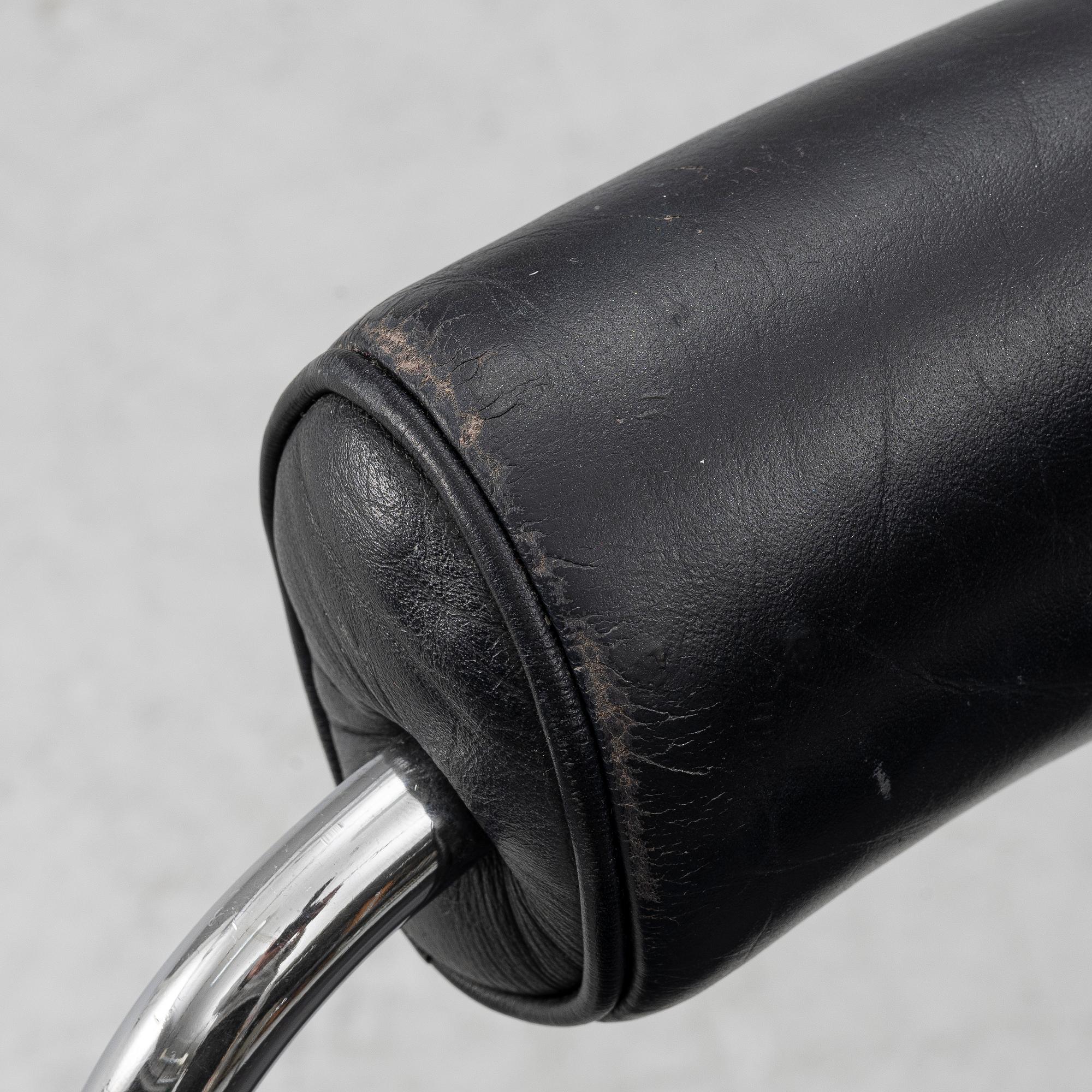 Charlotte Perriand, /Le Corbusier, swivel armchairs, a pair, model LC7, Cassina, Italy, later part of the 20th century.