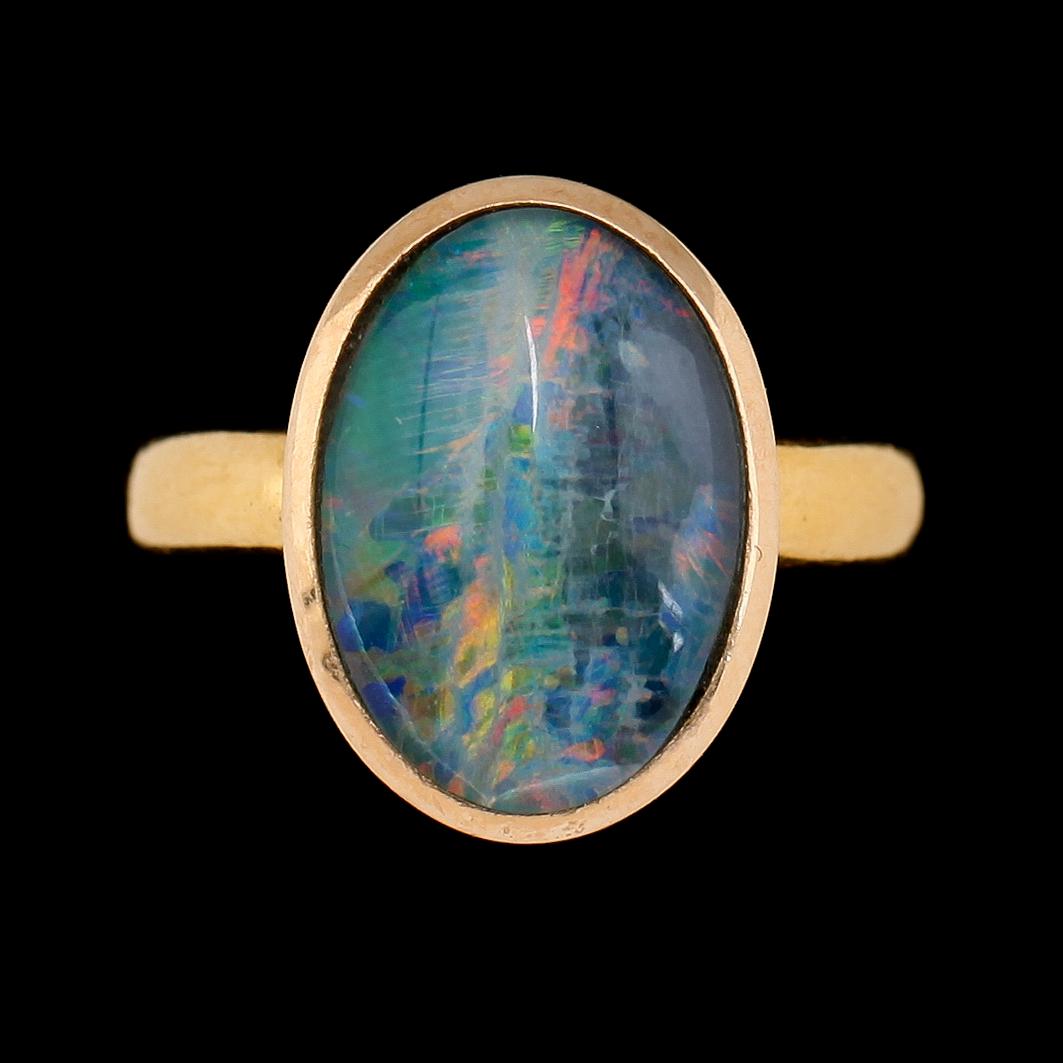 RING, 23K guld och opal, svenska stämplar, 1941. Total vikt ca 8 g.