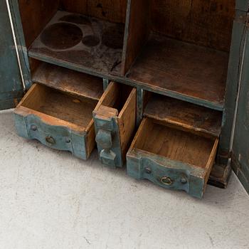 a wooden cabinet from 1843.