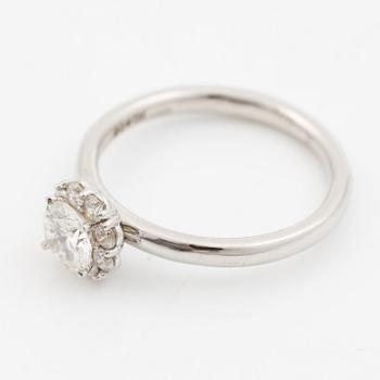Ring 18K white gold set with a brilliant-cut diamond, accompanied by an IGI report.