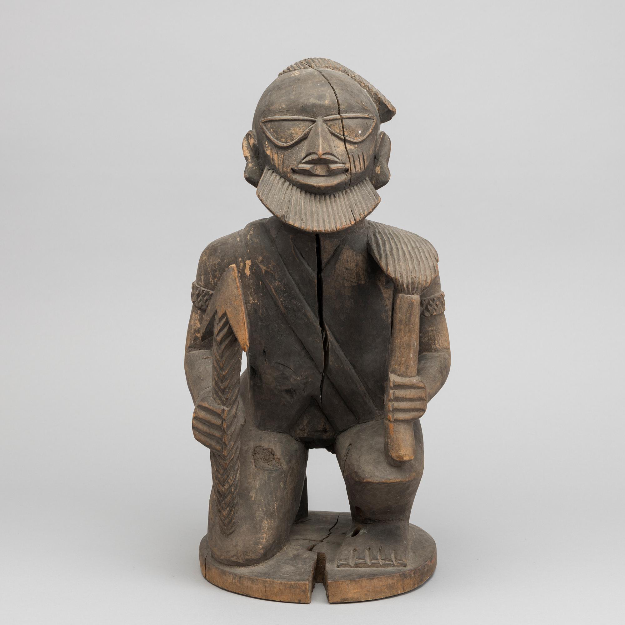 Male warrior figure, Yoruba, Nigeria.