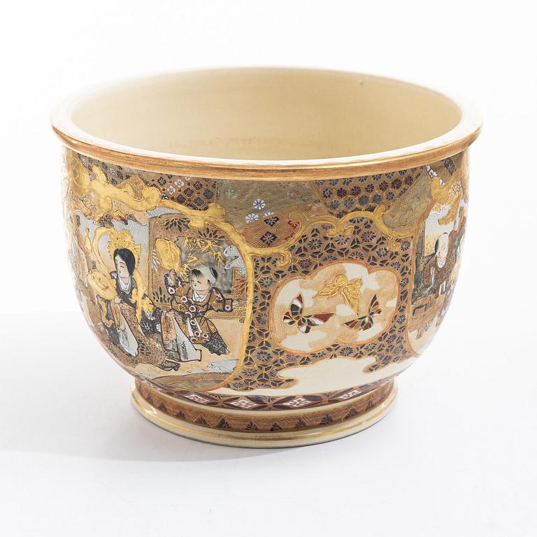 A Japanese satsuma figural flower pot, early 20th century.