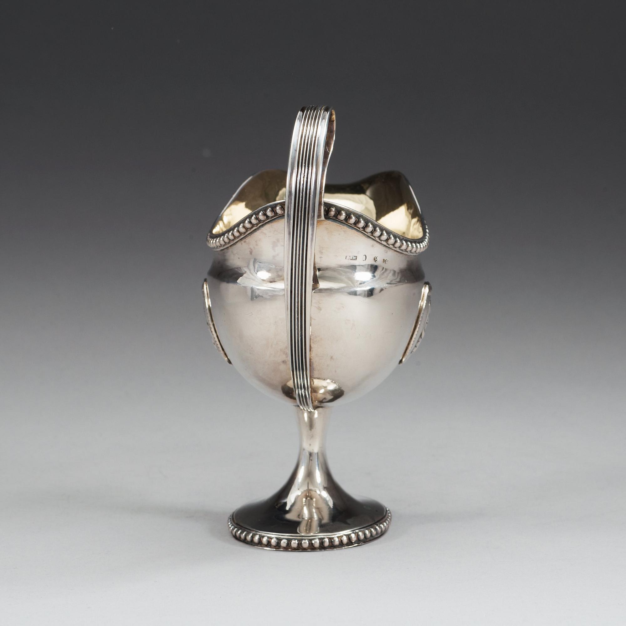 A Swedish 18th century parcel-gilt cream-jug, makers mark of Anders Fredrik Weise, Stockholm 1794.