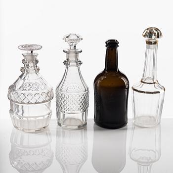 A set of eight glass bottles and decanters, circa 1800/19th Century.