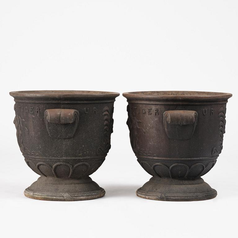 Ivar Johnsson, a pair of "Venus" cast iron urns, Näfveqvarns bruk, Swedish Grace.