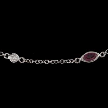 124. A ruby and diamond necklace.