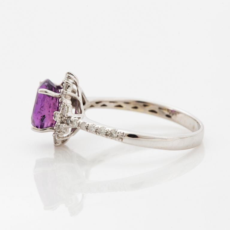 Pink purple sapphire and eight-cut diamond ring.