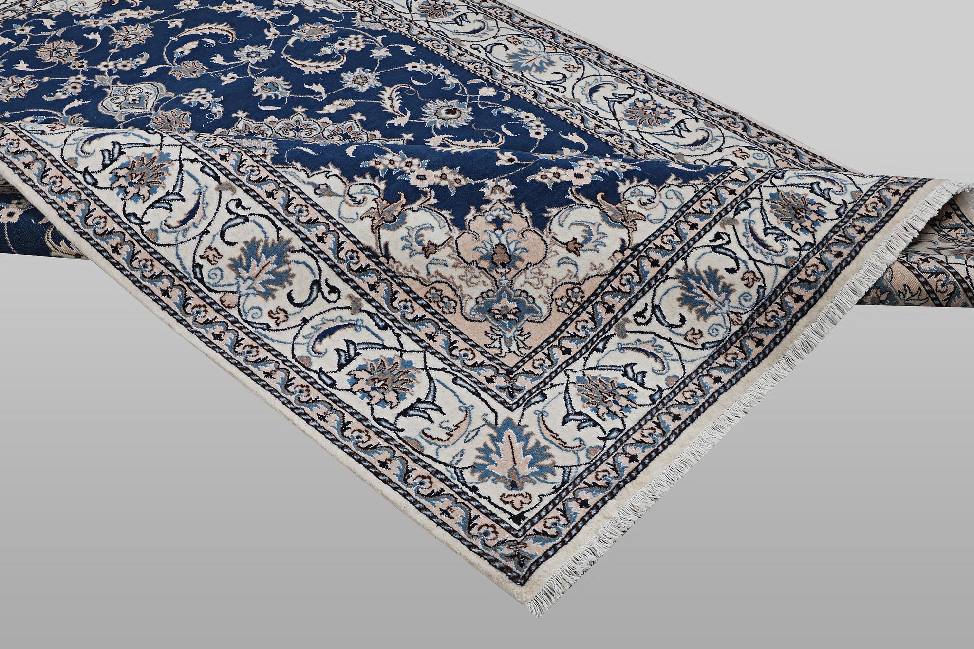 A carpet, Nain, part silk, ca 294 x 198 cm.