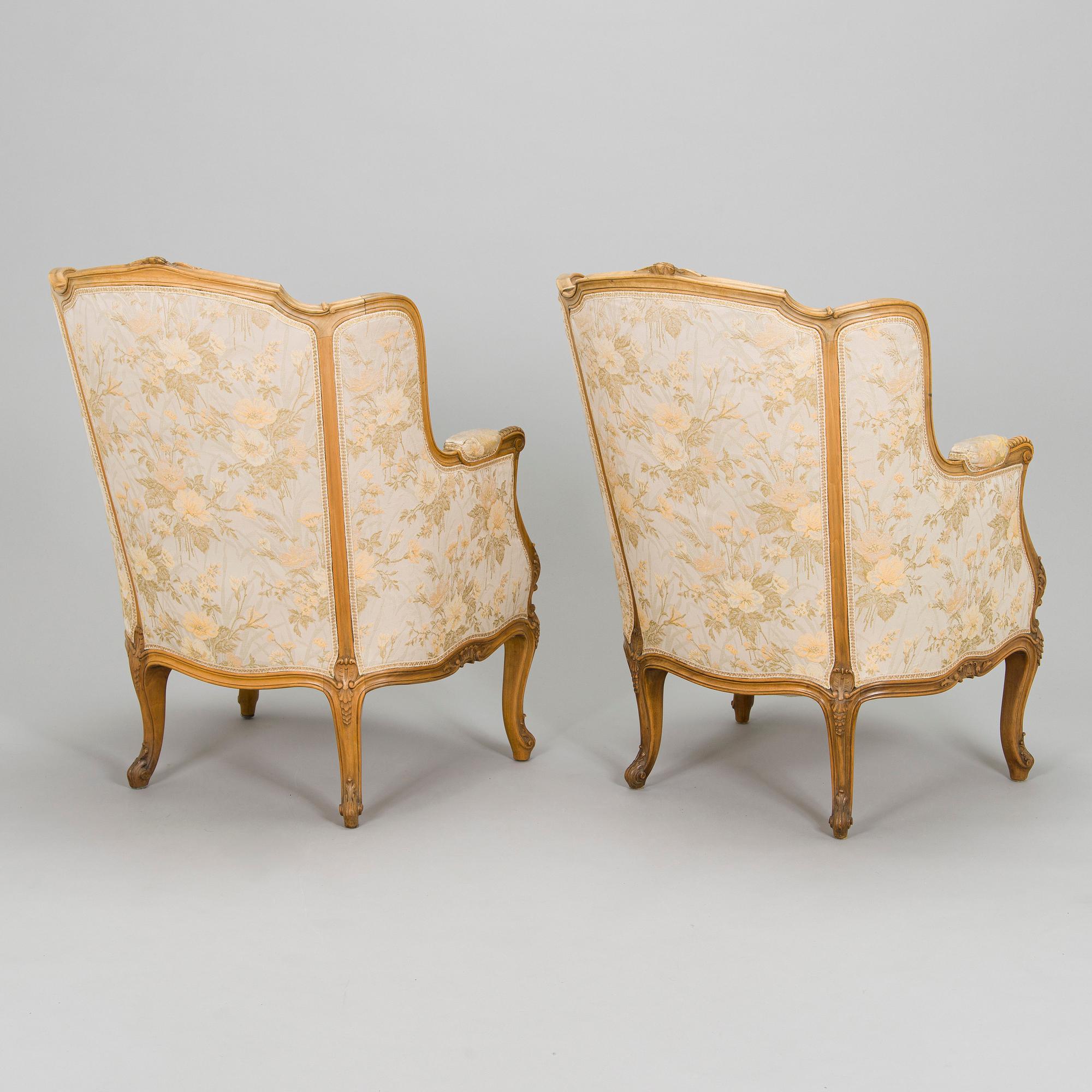 A pair of mid-20th-century French armchairs in Roccoco style.