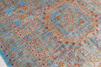 An oriental carpet with a Mamluk pattern, ca 299 x 210 cm.