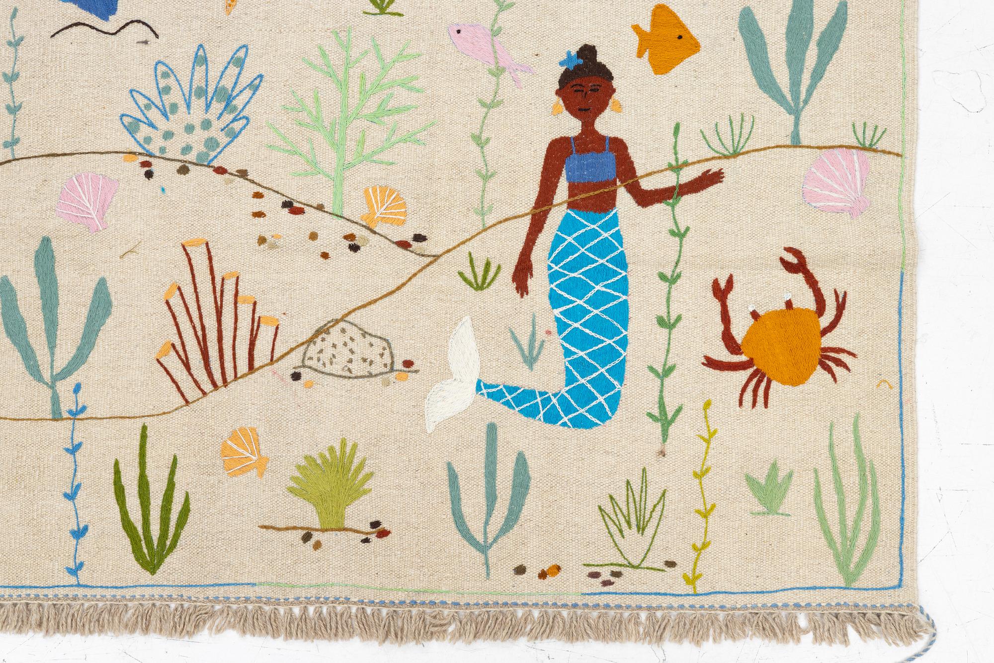 A hand-embroidered Kelim rug, 185 x 122 cm.