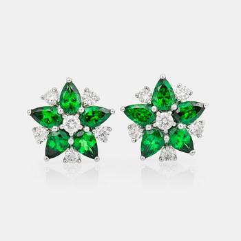 A pair of tsavorite garnet and diamond earrings. Total carat weight of tsavorites circa 4.80 cts and diamonds circa 1 ct.