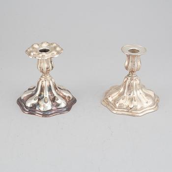 CG Hallberg, kandelaber samt ett par ljusstakar, silver, rokokostil, Stockholm, 1936 och 1935.