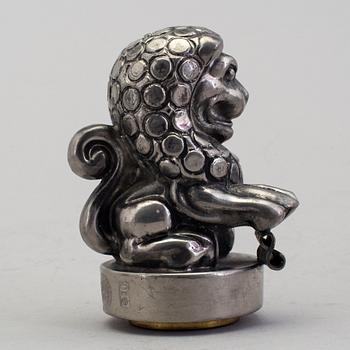 ANNA PETRUS, seal stamp with a brass stamp, pewter and brass, Svenskt Tenn, 1981 (year mark blurred).