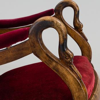 A 19th century swan arm rocking chair.