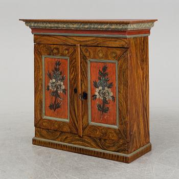 A 18/19th Century painted cabinet.