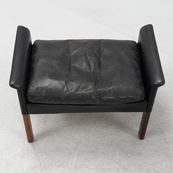 Hans Olsen,  a black leather easy chair with a stool, CS Möbler, Denmark, 1950's-60's.