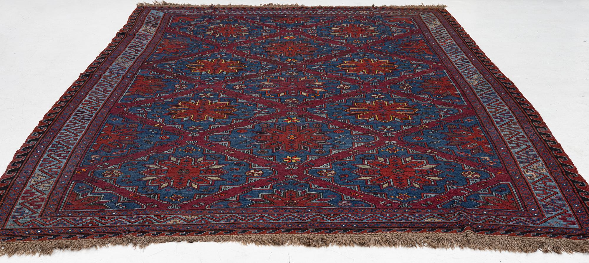 A semi-antique Sumak, probably Caucasian, c. 365 x 249 cm.
