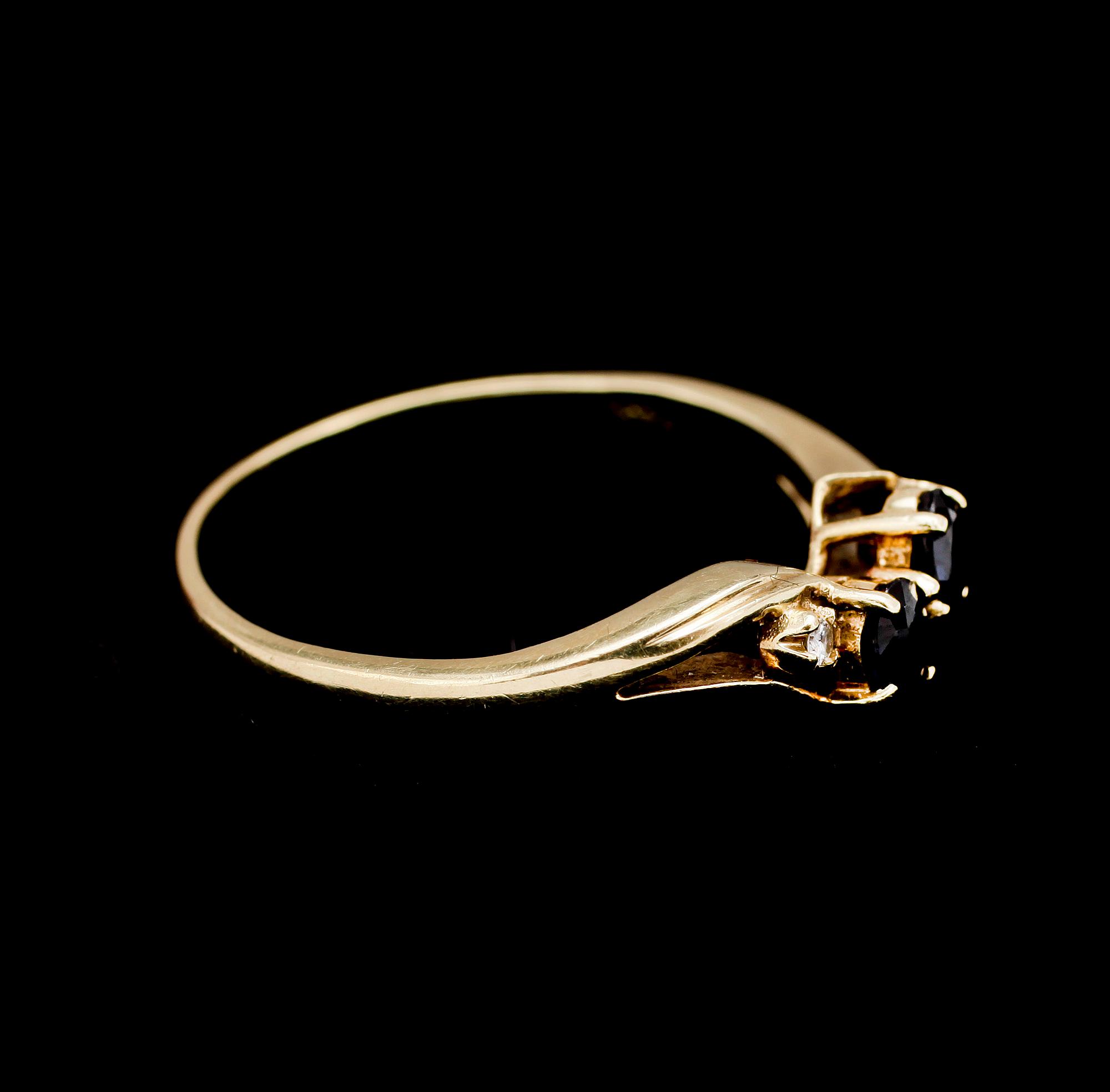 RINGAR, 2st, 14k guld med diamanter ca0,04ct och safirer tot ca0,30ct. Tot vikt 3,5g.