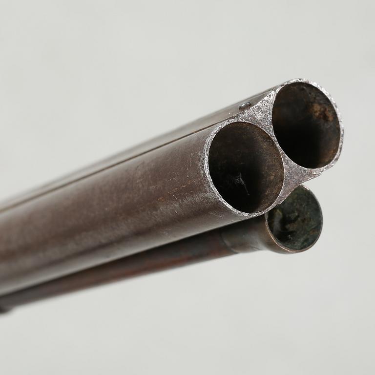 A percussion rifle by Charles William Lanchester in London, around the mid 19th century.