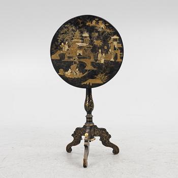 A Chinese tilt top table, around 1900.