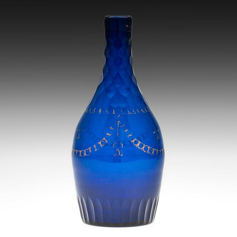 A DECANTER. Blue glass, partially cut and gilted decoration. Russia, early 1800s.