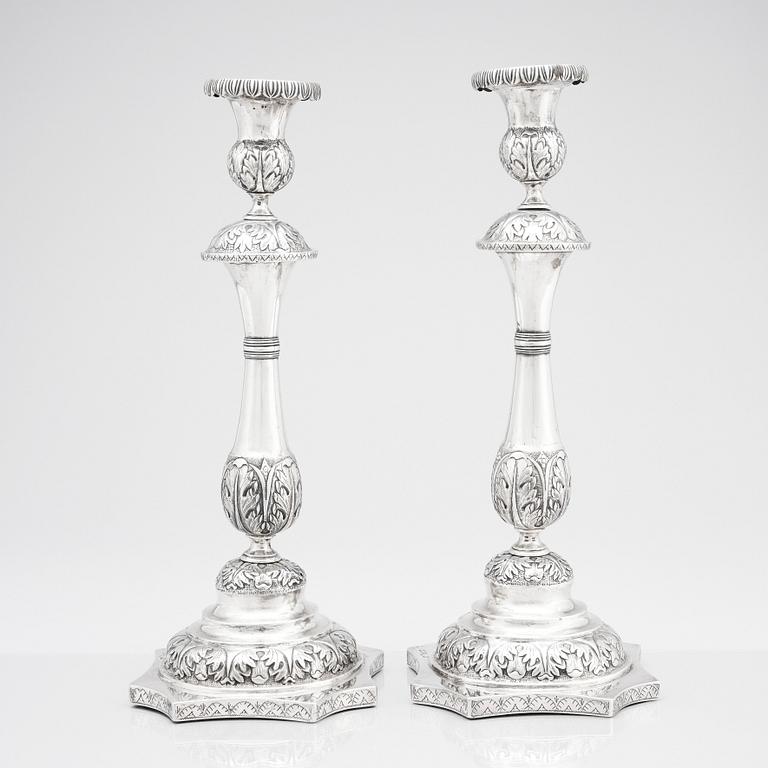 A pair 19th century Russian silver candlesticks, unidentified maker's mark, possibly Dimitry Agafanov (Kirov).