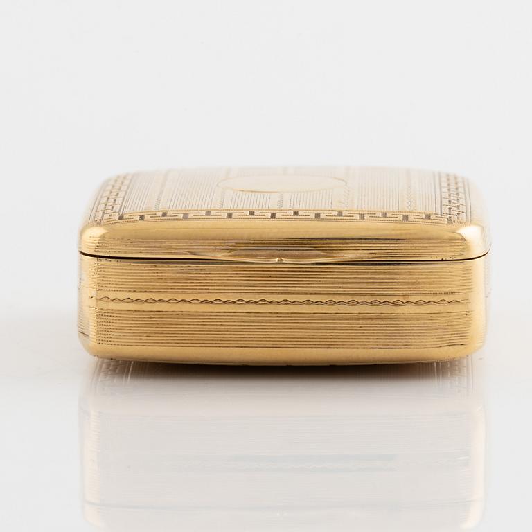 18K gold box.