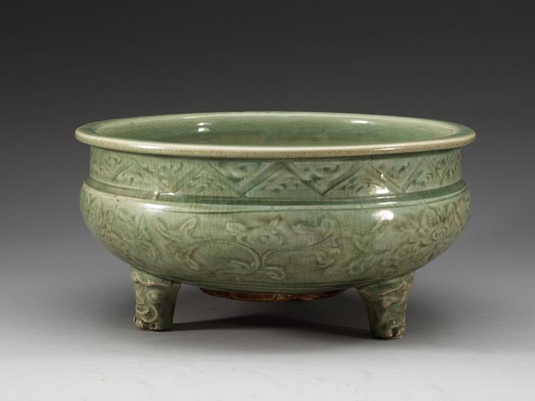 A large celadon tripod censer, Ming dynasty (1368-1644).